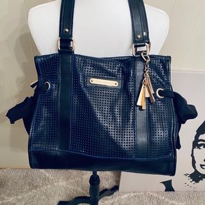 Juicy Couture perforated leather daydreamer